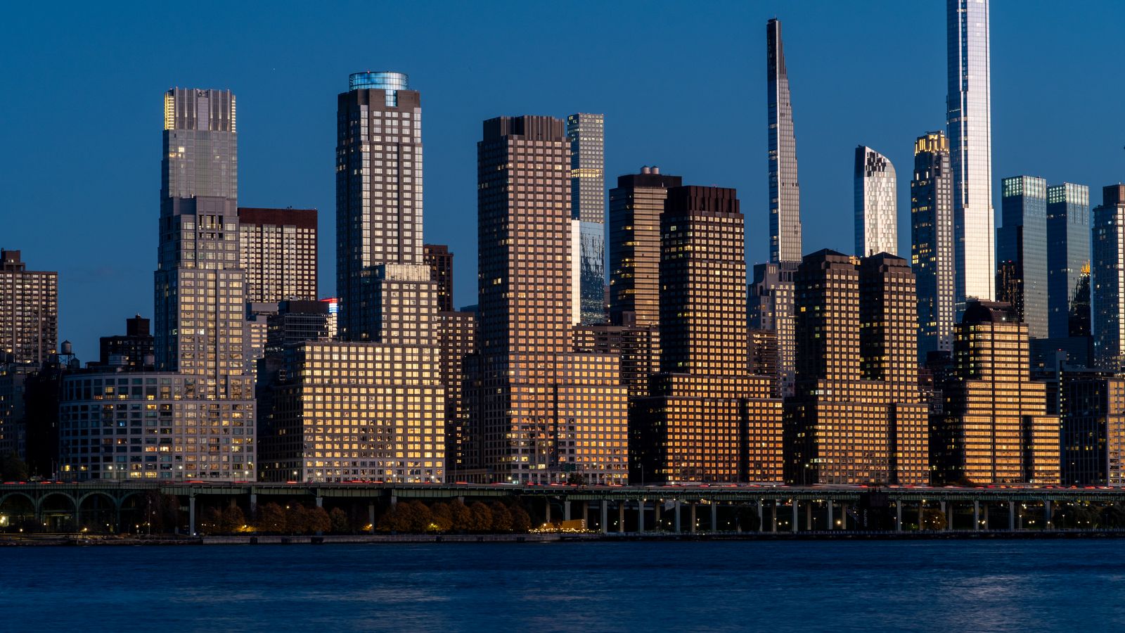 The New York City skyline at golden hour.
